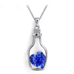 Bottled Up Love IOBI Crystals Necklace In Sapphire Blue For Woman