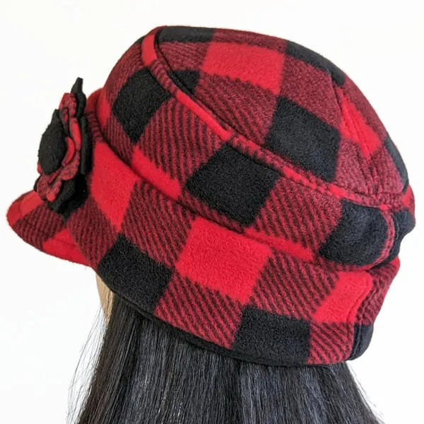 Fleece Fashion Cap with floral pin in popular plaid check, with fleece cuff and pin