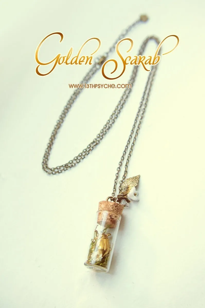 Golden beetle bottle pendant necklace