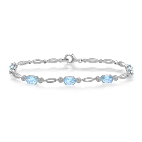 Jewelili Sterling Silver With Swiss Blue Topaz Oval Bracelet