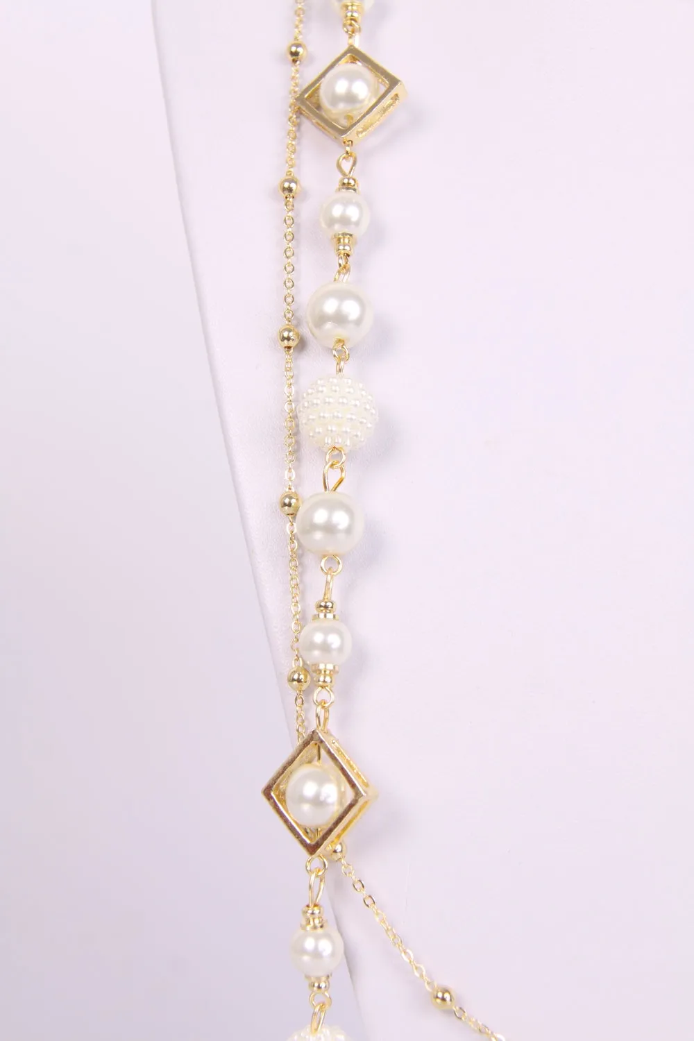 Pearls with square frames with gold and silver chain