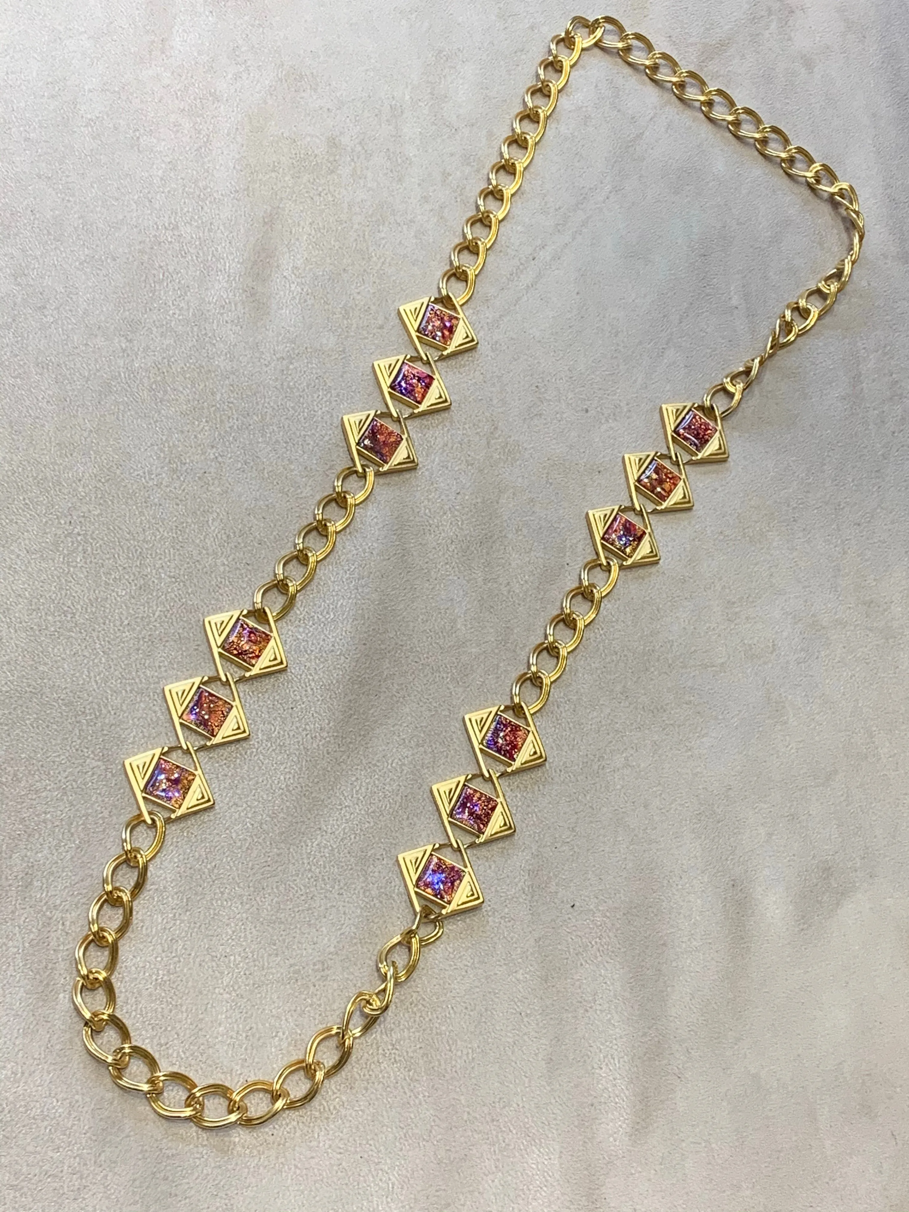 Yves Saint Laurent Long gold chain with dichroic glass