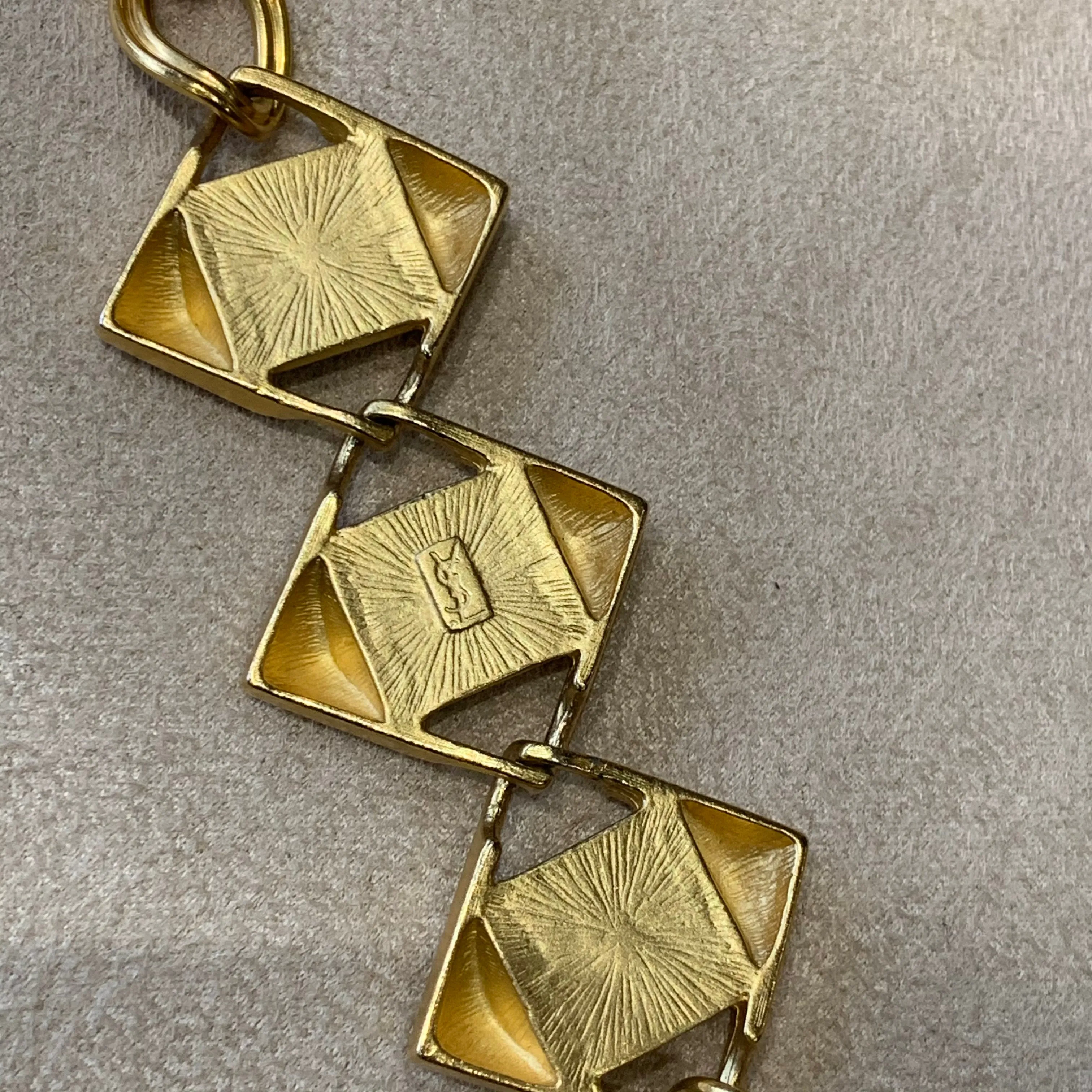 Yves Saint Laurent Long gold chain with dichroic glass